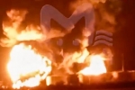 Мощный взрыв резервуара на горящей второй день российской нефтебазе сняли на видео