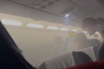 Паника в самолете после взрыва пауэрбанка пассажира попала на видео