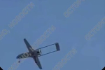 Пролетающий над подмосковным городом беспилотник ВСУ сняли на видео
