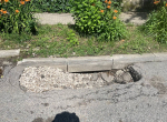 Опасные провалы асфальта на Дарвина в Калуге начали устранять